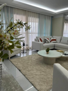APARTAMENTO EM EDIFICIO 100% MOBILIADO PARA TEMPORADA